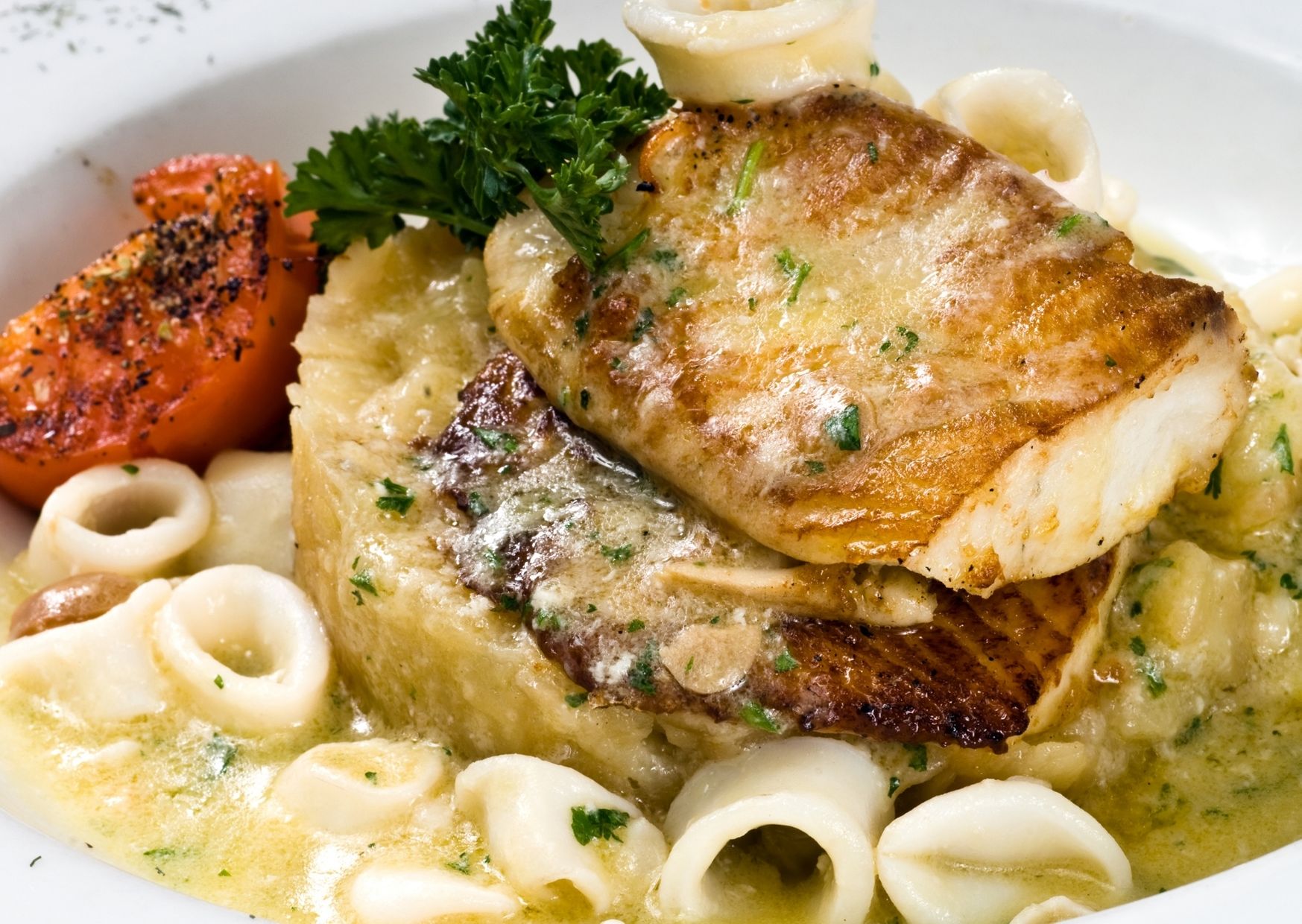 Filetes de merluza gratinados